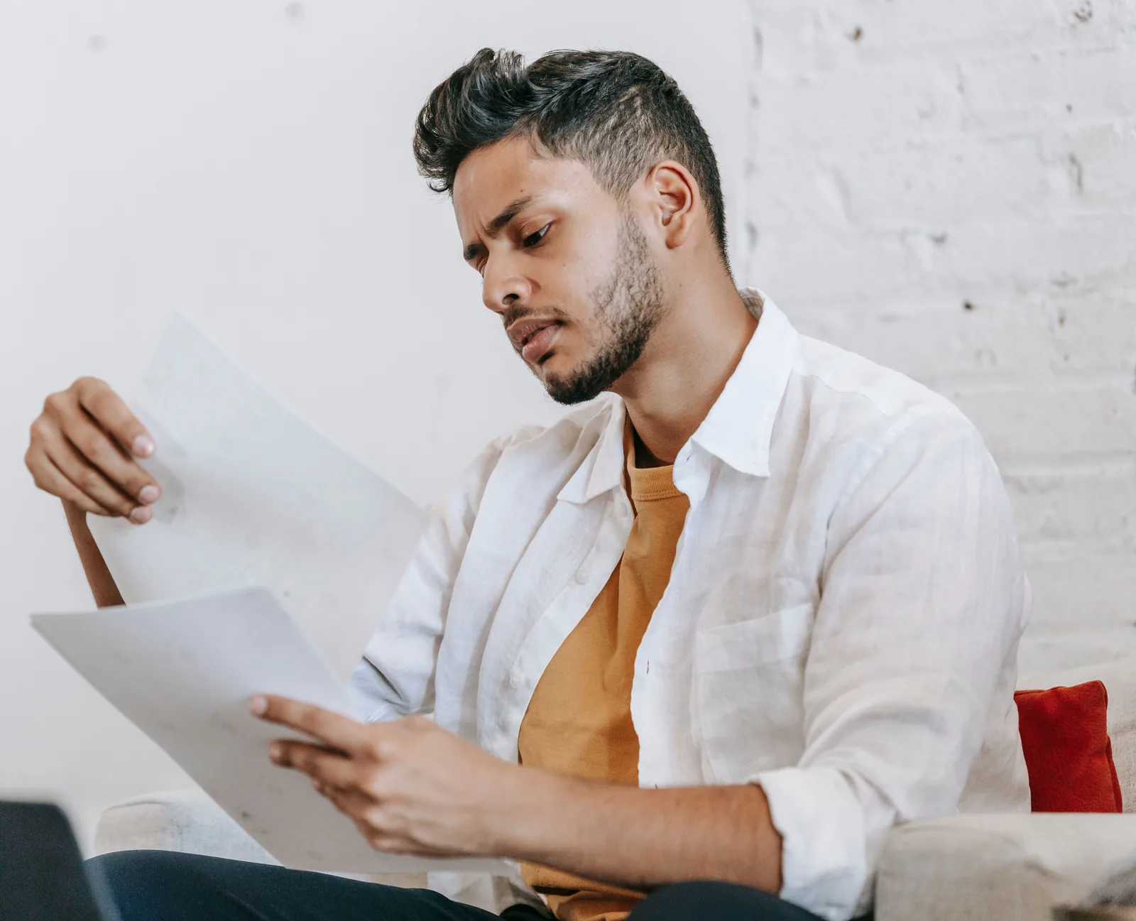 Restaurant owner reviewing financial reports
